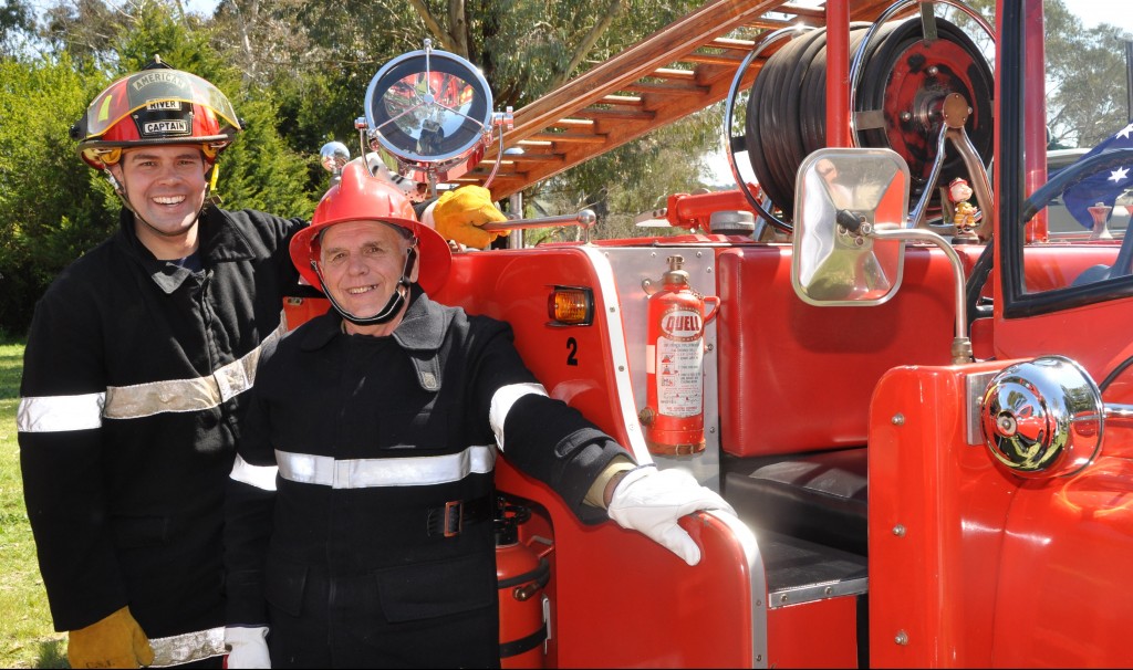 Brenton and his father Leigh Ragless with Leigh's  vintage 1961 fire engine